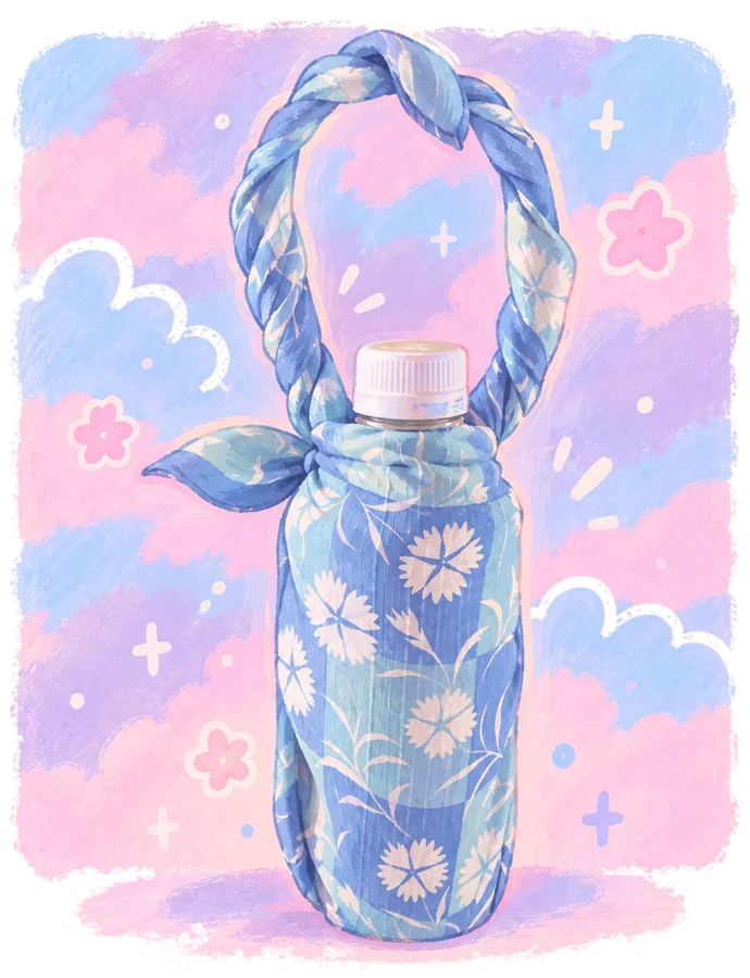 Bottle wrapped in a blue floral Carré with a braided handle
